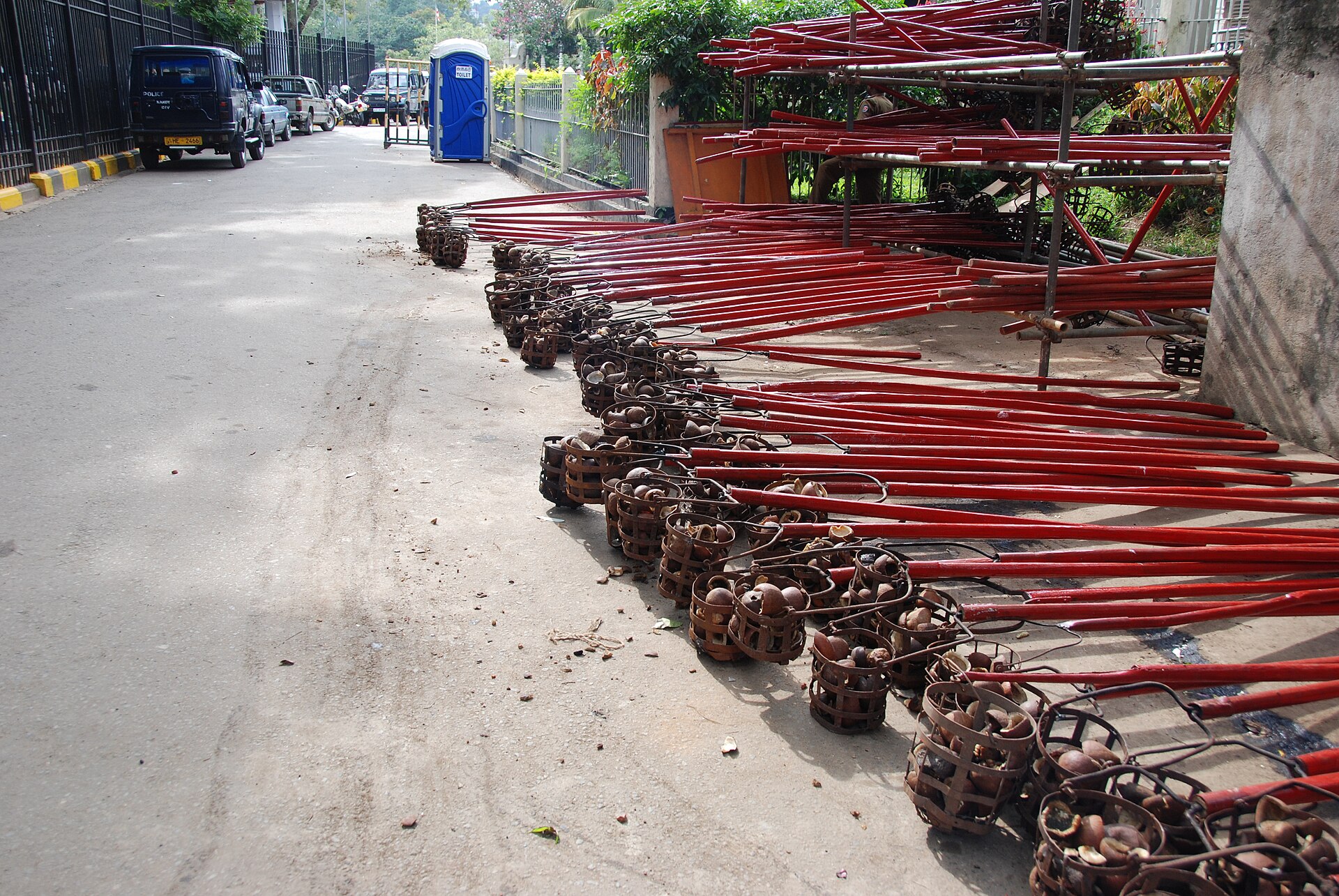 Procession lit by rows of burning coconut lamps
